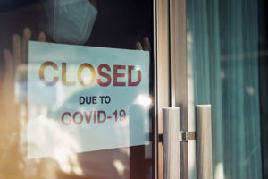 Closed Due to COVID-19 sign on door