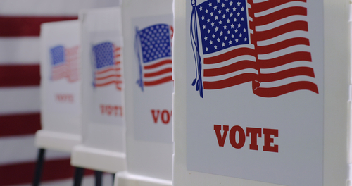 Voting stations with flag and "VOTE"